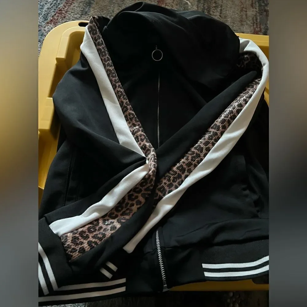 Kidpik track jacket with zipper closure front and leopard and stripe detailing